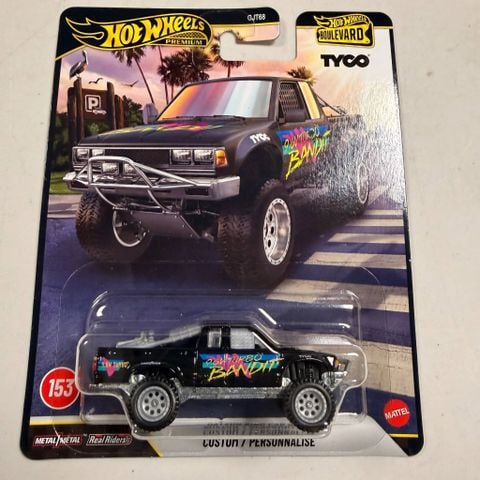  Mô hình xe JHW32 Hot Wheels BOULEVARD DATSUN KING CAB 
