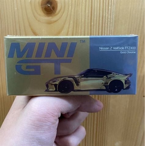  Xe Mini GT MGT00985 Nissan Z VeilSide FZ400 Gold Chrome 