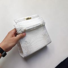 Túi nữ mini cầm tay có dây đeo. Da bụng cá sấu Himalaya!