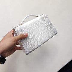 Túi nữ mini cầm tay có dây đeo. Da bụng cá sấu Himalaya!