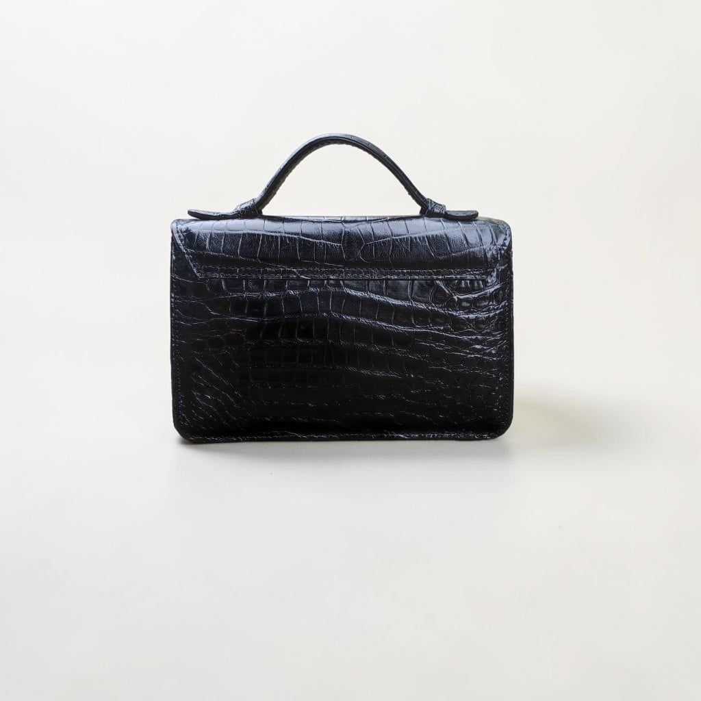 Túi xách khóa Nữ hoàng có dây đeo. Size 23*15*9cm vừa vặn!