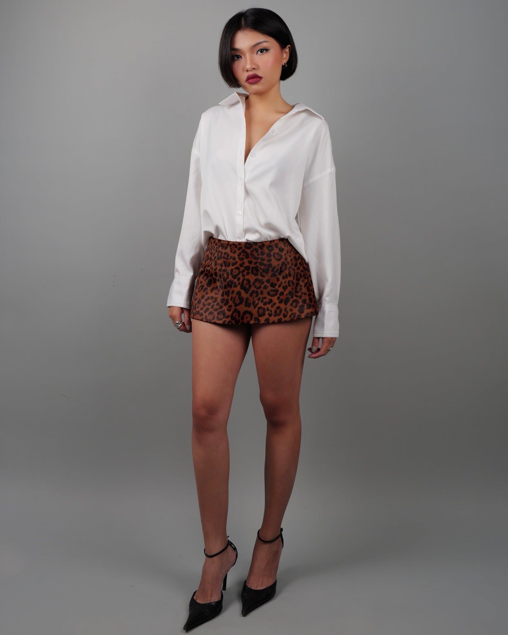 Leopard-Print Mini Leather Skirt