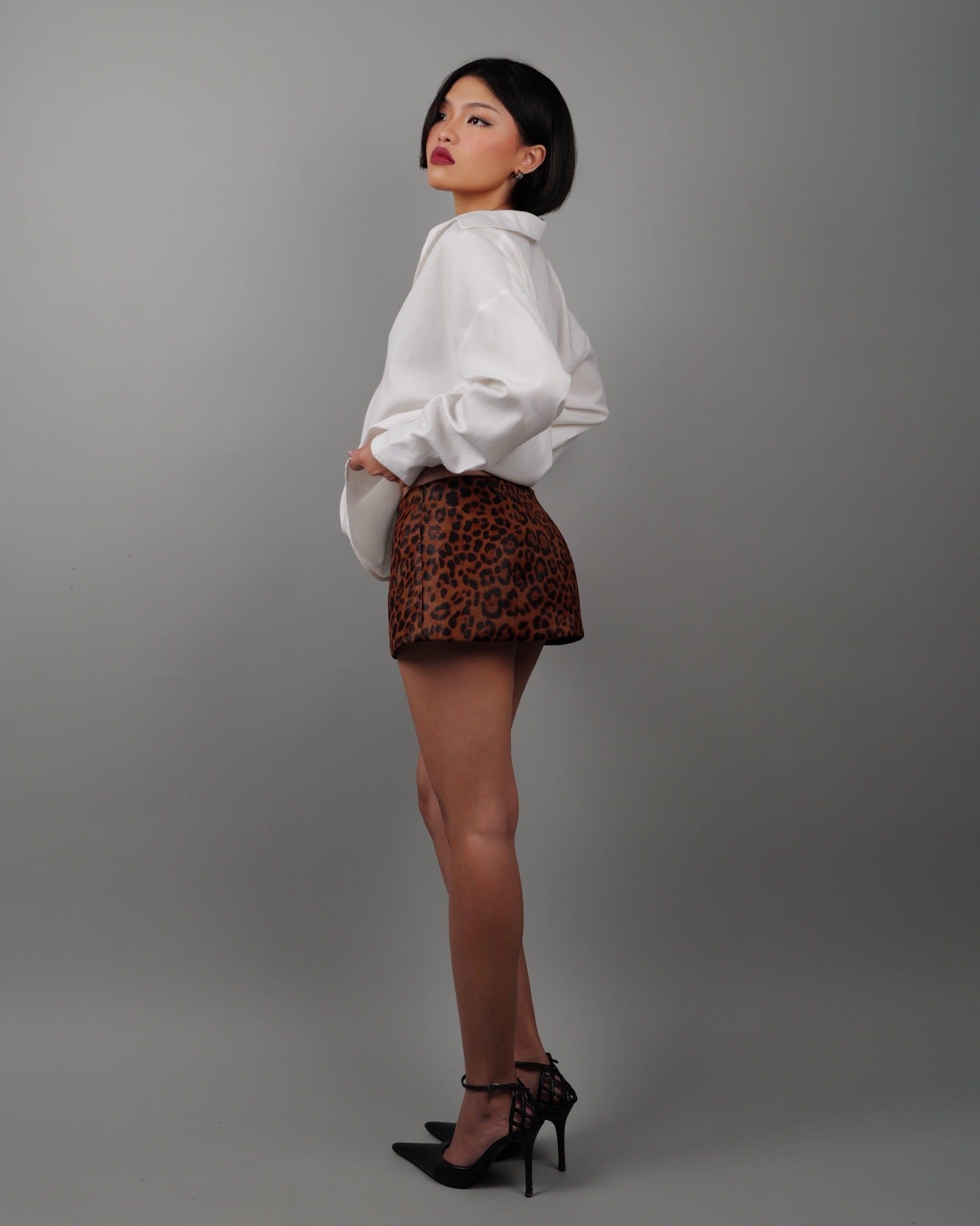 Leopard-Print Mini Leather Skirt