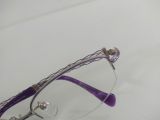  Gọng kính nửa viền titanium màu bạch kim viền màu tím nhẹ Charmant Line Art (XL1070). 
