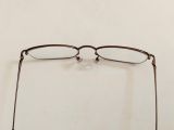  Gọng kính màu nâu đồng hun khói thương hiệu Jins Nhật Bản. (Độ mới khoảng 95%). 