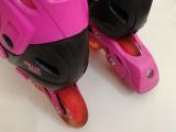  Patin màu hồng cánh sen phối màu xanh và đen Centosy T-rex size 35 co giãn 38. 