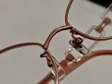  Gọng kính nữ titanium mầu hồng cam Charmant Line Art (XL1058). (Độ mới khoảng 96%). 