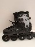  Patin màu đen Flying Eagle size 33 co giãn 37 (Tầm chân size 31 32 vẫn đi tốt). 