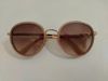  Kính râm màu hồng phớt tròng nâu gọng màu vàng tây thương hiệu Look Optical (Hàn Quốc). 