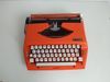  Máy đánh chữ cổ điển nhiều năm tuổi màu cam hiếm gặp Nippo (Made in Japan). 