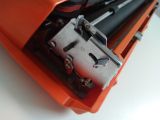  Máy đánh chữ cổ điển nhiều năm tuổi màu cam hiếm gặp Nippo (Made in Japan). 