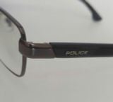  Gọng kính titanium màu ghi hun khói Police (VPLF44J). 