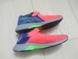  Giày thể thao trẻ em màu đỏ cam Asics size 33.5 tương đương 21cm chuẩn xịn. 