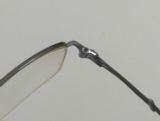  Gọng kính nửa viền nam giới titanium cao cấp màu hun khói Charmant Line Art (XL1012 GR). 