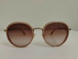  Kính râm màu hồng phớt tròng nâu gọng màu vàng tây thương hiệu Look Optical (Hàn Quốc). 
