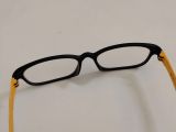  Gọng kính màu đen càng màu vàng ExFash (Made in Korea). 