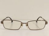  Gọng kính titanium màu vàng đồng nhạt thương hiệu Trussardi. 