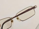  Gọng kính titanium màu vàng đồng nhạt thương hiệu Trussardi. 