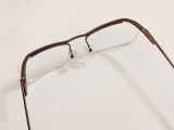  Gọng kính màu nâu nửa viền thương hiệu Morel thương hiệu Pháp. 