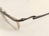  Gọng kính dáng nửa viền titanium màu hun khói thương hiệu AMI PARIS. (Made in Japan). 