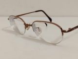  Gọng kính titanium cao cấp dáng nửa viền màu nâu sáng thương hiệu NewYorker (Made in Japan). 