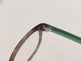  Gọng kính màu lông chồn vân đá kết hợp xanh ngọc thương hiệu Jins. 