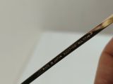  Gọng kính titanium dáng nửa viền màu vàng tây thương hiệu Prince (Made in Japan). 