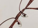  Gọng kính nữ titanium dáng nửa viền màu nâu thương hiệu Daks của Anh Quốc. (DK-4006) 