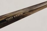  Gọng kính titanium dáng nửa viền màu bạch kim càng nâu vân đá thương hiệu Takeo Kikuchi. 