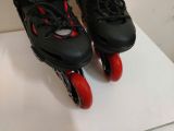  Patin màu đen và màu đỏ Flying Eagle size 33 co giãn 37 (chân giày thường size 30 31 đã có thể đi tốt). 