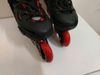  Patin màu đen và màu đỏ Flying Eagle size 33 co giãn 37 (chân giày thường size 30 31 đã có thể đi tốt). 