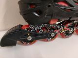  Patin màu đen và màu đỏ Flying Eagle size 33 co giãn 37 (chân giày thường size 30 31 đã có thể đi tốt). 