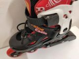  Patin màu đen và màu đỏ Flying Eagle size 33 co giãn 37 (chân giày thường size 30 31 đã có thể đi tốt). 