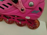  Patin màu hồng cánh sen phối màu xanh và đen Centosy T-rex size 35 co giãn 38. 