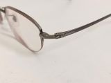  Gọng kính tianium mầu hun khói dáng nửa viền thương hiệu Valentino Christy. 