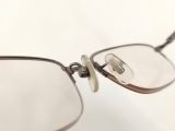  Gọng kính tianium mầu hun khói dáng nửa viền thương hiệu Valentino Christy. 