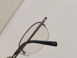  Gọng kính tianium mầu hun khói dáng nửa viền thương hiệu Valentino Christy. 