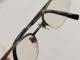  Gọng kính tianium mầu hun khói dáng nửa viền thương hiệu Valentino Christy. 