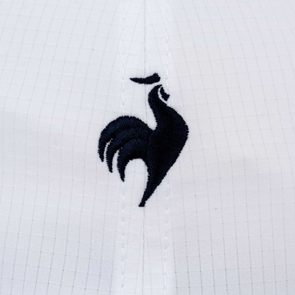 golfer đội mũ Le Coq Sportif phong cách thanh lịch