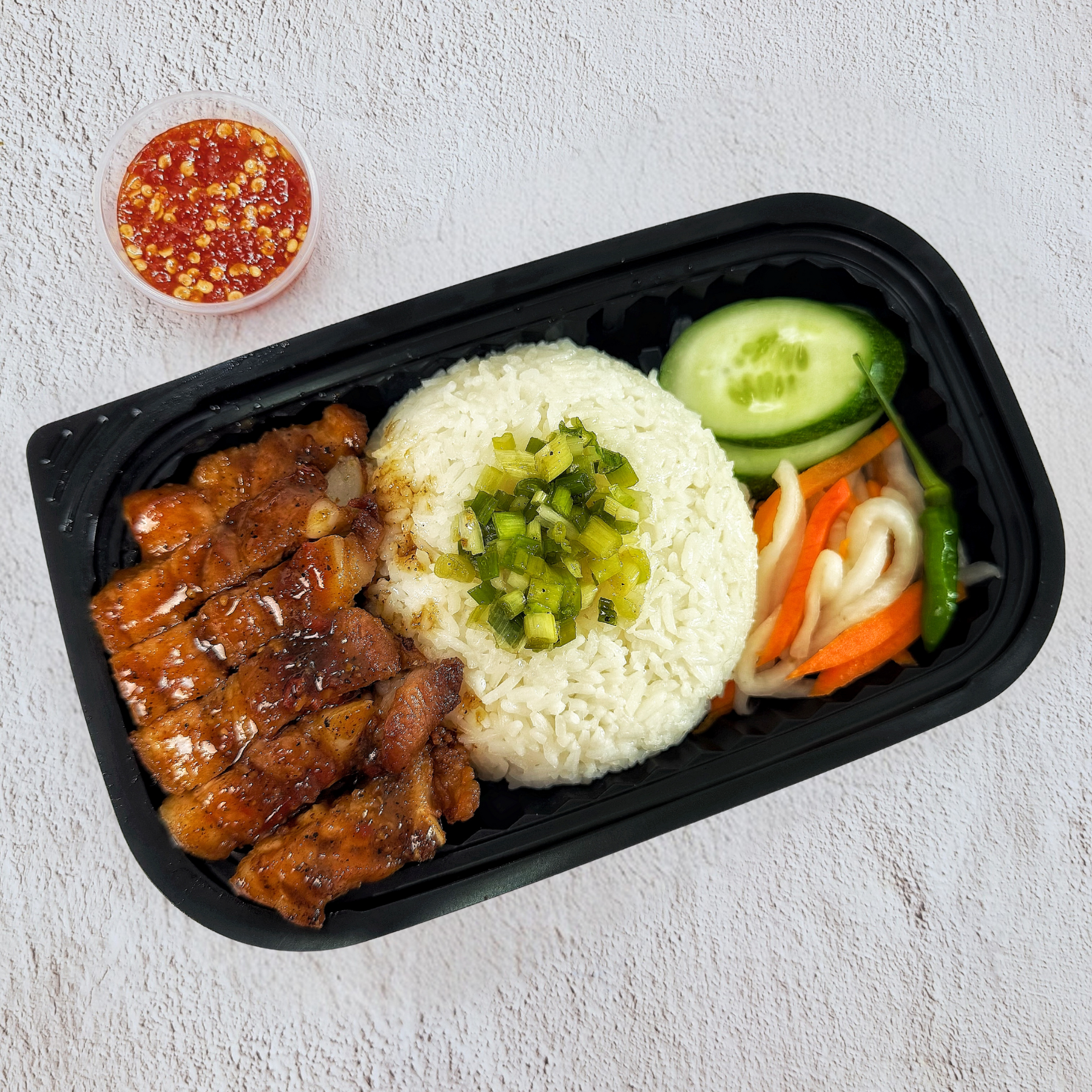  Cơm Ba Rọi Rút Sườn Xốt Mắc Khén 