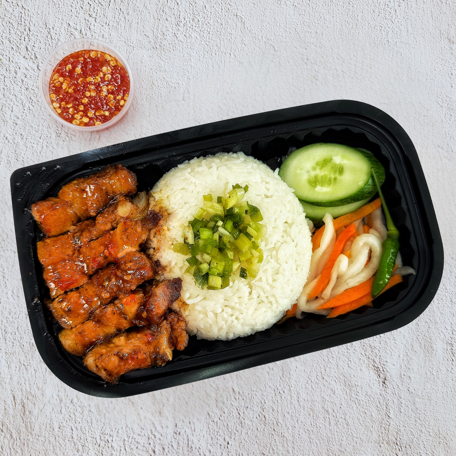  Cơm Ba Rọi Rút Sườn Xốt Chua Cay 