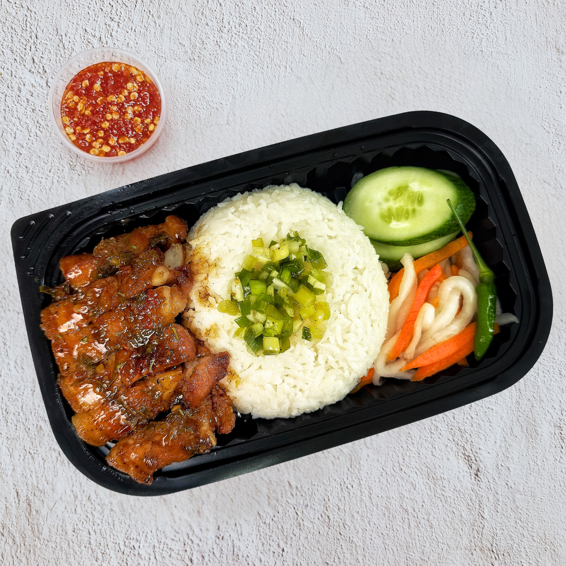  Cơm Ba Rọi Rút Sườn Xốt Lá Chanh 