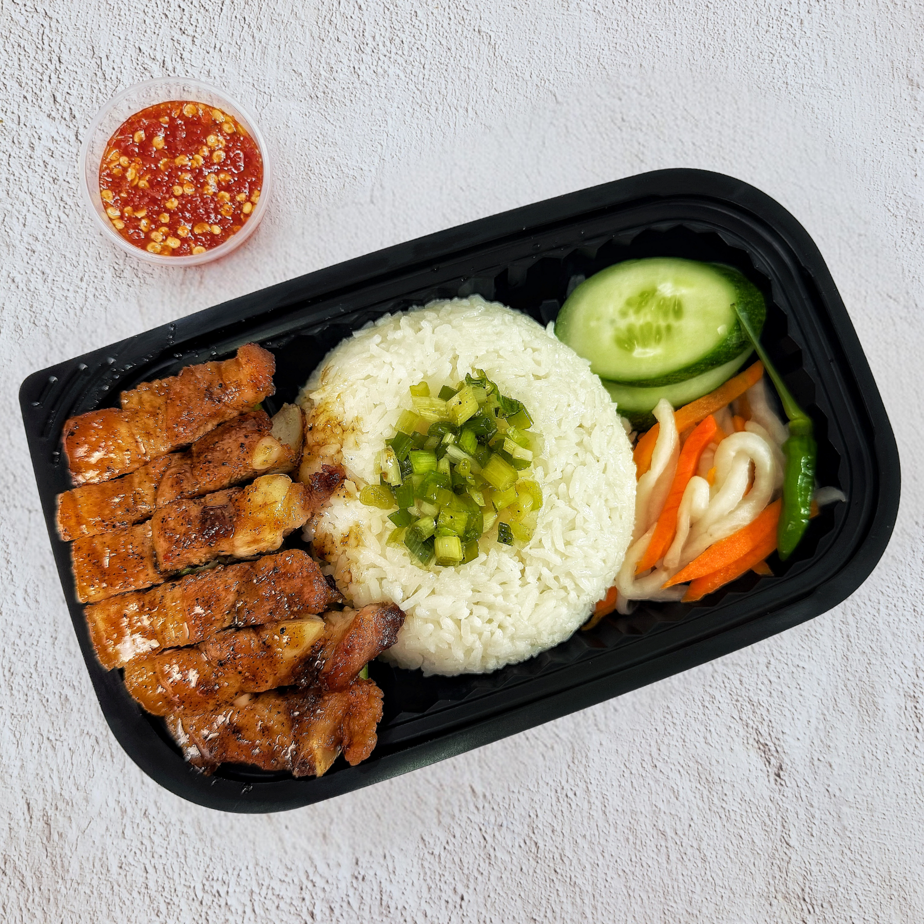  Cơm Ba Rọi Rút Sườn Xốt Tiêu 