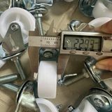  Bánh xe nhựa màu trắng ty ren M8, M12 (cái) 