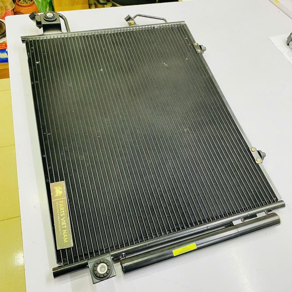 Dàn ( giàn ) nóng điều hòa Mitsubishi Pajero V73, V74, V93. Đời 2000 - 2007. Hàng Paco Thailand. Mã 7812A050, MN123332, MR513108