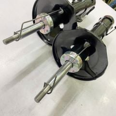 Giảm xóc trước, phuộc nhún trước Toyota Corolla Altis máy 1.6, 1.8, 2.0 đời 2007-2014. Mã Showa Japan. 48510-09T30 (RH), 48520-09L60 (LH) ( 1 cái )