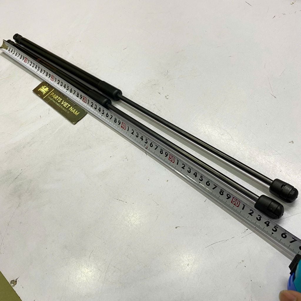 Ty chống nắp ca pô, phuộc ca pô hay ca bô Toyota Camry (ASV71, AXVA70, AXVH71, MXVA71) đời 2017 - 2025. Hàng thay thế chất lượng cao dài 65 cm.  Mã 53440-06190 (phải), 53450-06160 (trái) ( 1 đôi )