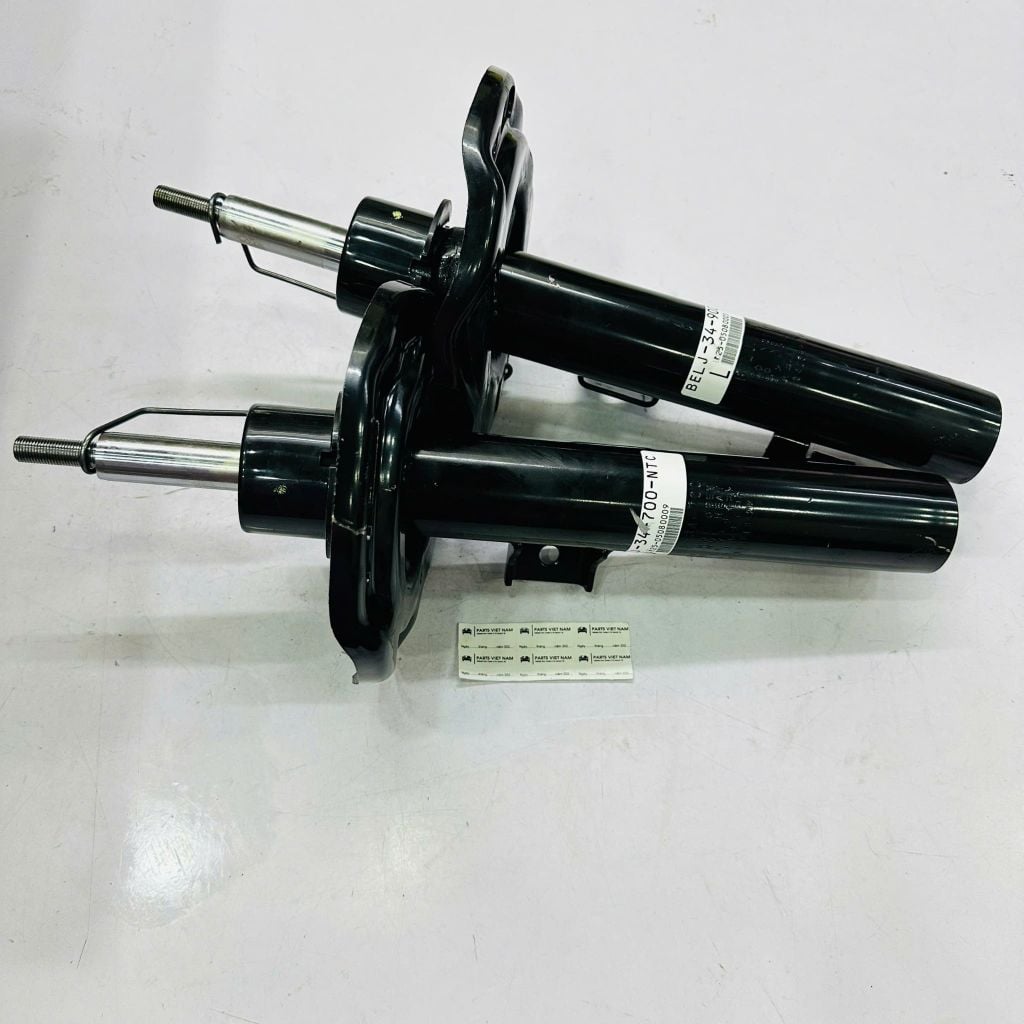 Giảm xóc trước, phuộc nhún trước Mazda 3 các đời 2019 - 2024. Hàng Showa Japan. Mã OE: BACF-34-700B (RH - Phụ) và BACF-34-900B (LH - Tài) ( 1 cây )