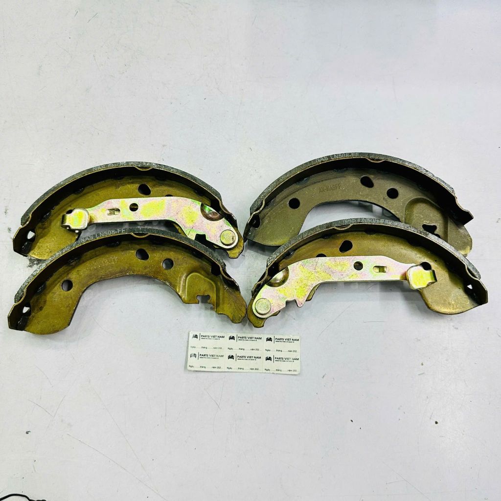Má phanh guốc sau guốc, bố thắng đùm Nissan Sunny, Almera máy QG15, QG16 đời 2006 - 2012. Hàng chất lượng cao. Mã 4406095F0A, 44060-95F0A