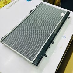 Két nước làm mát động cơ Ford Laser 1.6, Mazda 323, Premacy số sàn (MT) đời 2000 - 2005. Hàng Tongshin Taiwan, tản nhiệt nhôm. Mã B6FN15200, B6BF15200G, BPD315200H